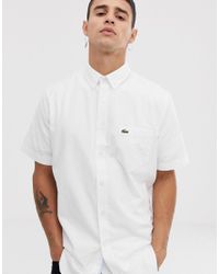 lacoste white short sleeve shirt