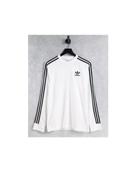 adidas Originals Baumwolle – adicolor – langärmliges shirt mit den drei  streifen in Weiß | Lyst DE