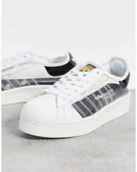 Zapatillas llamativas con paneles transparentes en blanco superstar adidas  Originals | Lyst