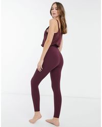 purple nike jumpsuit