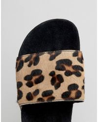 adidas adilette slides leopard