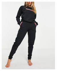 Tommy Hilfiger Track pants and sweatpants for Women - Up to 70% off at  Lyst.com