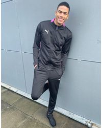 puma tracksuit black