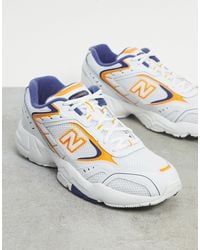 452 - Sneakers gialle e bianche da Uomo di New Balance in Bianco ...