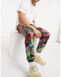 adidas Originals Combi-set - Fleece joggingbroek Bedekt Met Print in het  Rood voor heren - Lyst