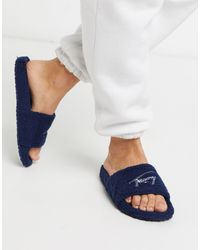 Tommy Hilfiger Synthetisch Slippers Van Teddy Stof Met Kenmerkend Logo in  het Blauw - Lyst