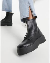 Botas negras con suela gruesa y cremallera en la parte delantera TOPSHOP de  color Negro | Lyst