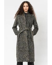 religion leopard coat