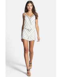 white beaded romper