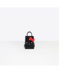 balenciaga hello kitty phone holder