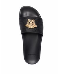 Versace Flip-flops and slides for Women - Up to 36% off at Lyst.com