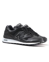 black leather new balance trainers
