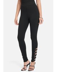 Bebe Synthetic High Waist Side Tape Metal Ring Leggings In Black Lyst