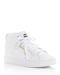 white puma high tops