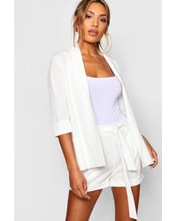 white shorts and blazer co ord