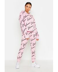 woman all over print hooded tracksuit