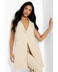 sleeveless open front blazer