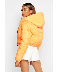 cropped orange puffer jacket