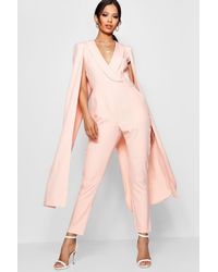 pink jumpsuit with cape