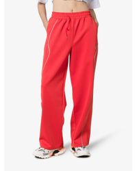 ADER ERROR Red Contrast Piping Track Pants