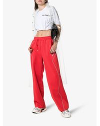 ADER ERROR Red Contrast Piping Track Pants
