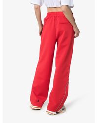 ADER ERROR Red Contrast Piping Track Pants