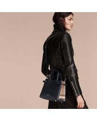 the small banner in leather and house check