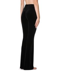 Leggings acampanados en terciopelo devoré - Calzedonia