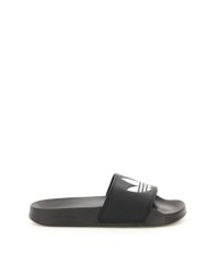adidas Slippers for Men - Up to 35% off at Lyst.com