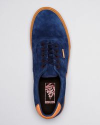 blue vans brown sole