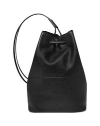 Fossil Vintage Reissue Leather Sling Bag in Black - Lyst