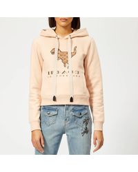 white sweatshirt with green writing