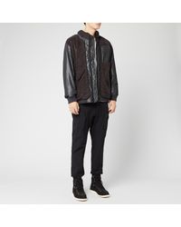 white mountaineering boa bomber jacket