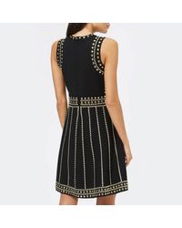 michael kors black dress with gold studs