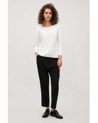 cos white jumper