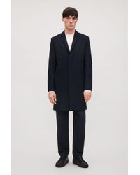 navy blue tailored coat