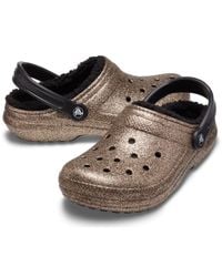 gold glitter crocs with fur