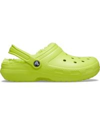 green fur crocs