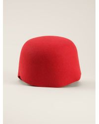 red felt cap