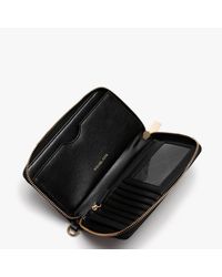 samira large pebbled smartphone wristlet