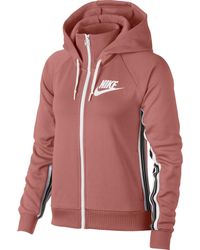 nike women's sportswear tracksuit joggers rust pink
