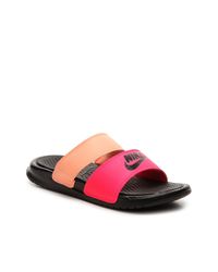 peach nike slides