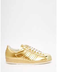 gold silver trainers