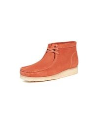 orange clark wallabees