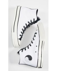 psy kicks converse white