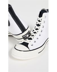 psy kicks converse white