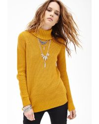 mustard yellow turtleneck sweater