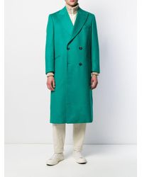 green fitted coat