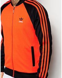 orange adidas jacket mens