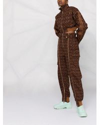 adidas Katoen X Ivy Park Broek Met Monogramprint in het Bruin - Lyst